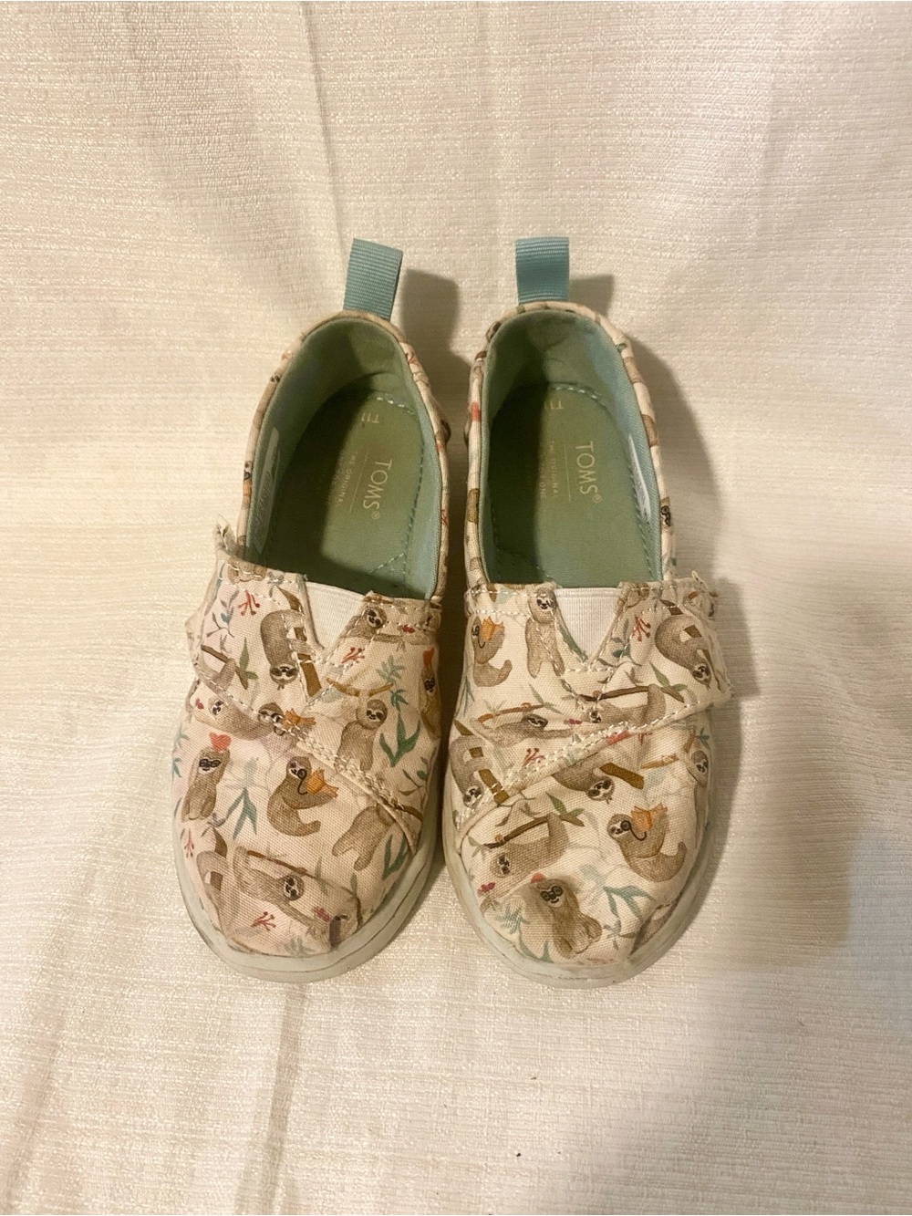 TOMS Kids Neutral Beige Slip-On Sneakers with Sloth Print
